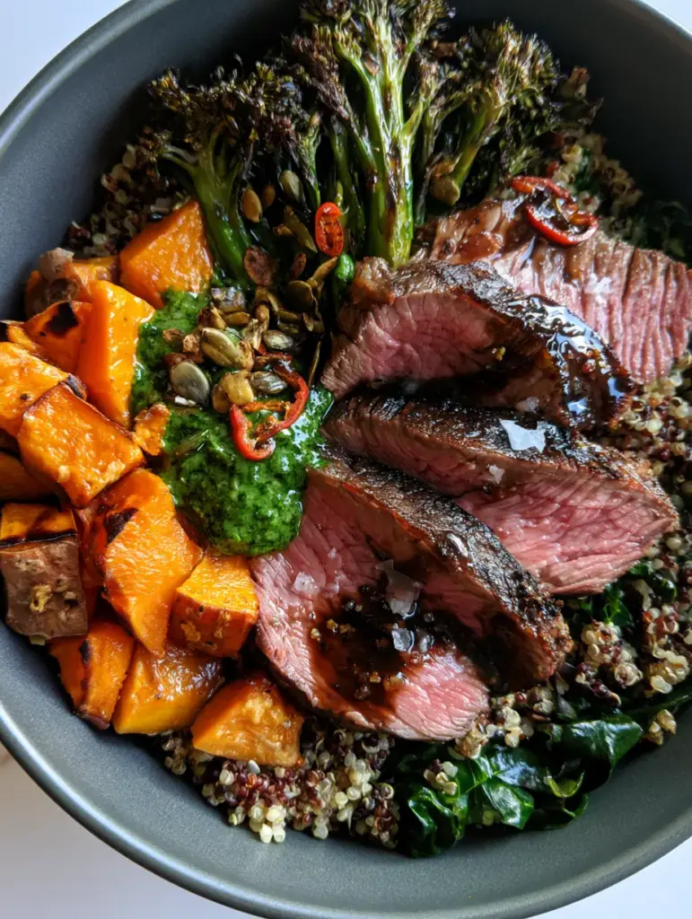 High Protein Recipes: The Ultimate Balsamic Sirloin and Quinoa Power Bowl 1 Roasted sweet potatoes and charred tenderstem broccoli in a gourmet high protein bowl.